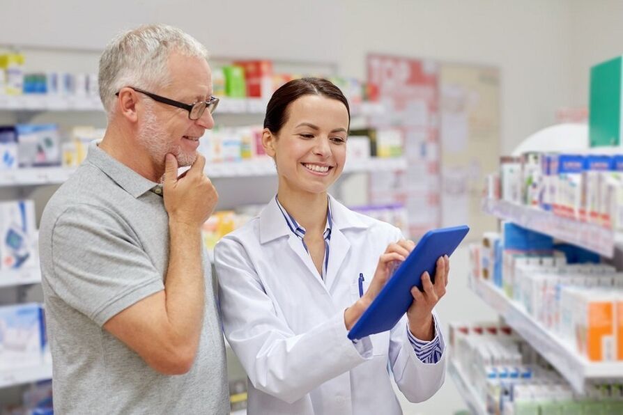 Doctor prescribes medicine for parasites to a man